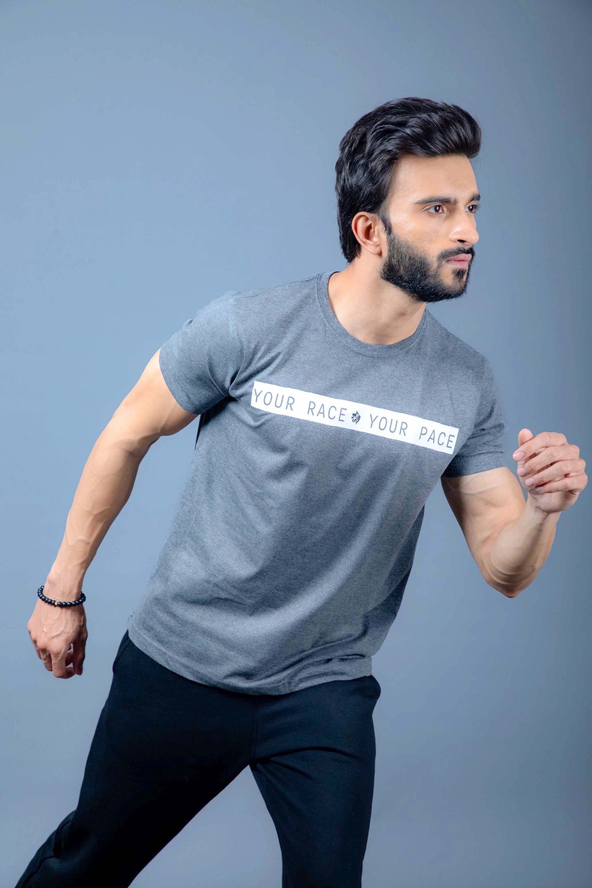 Man wearing breathable cotton gym t-shirt and shorts during a workout
