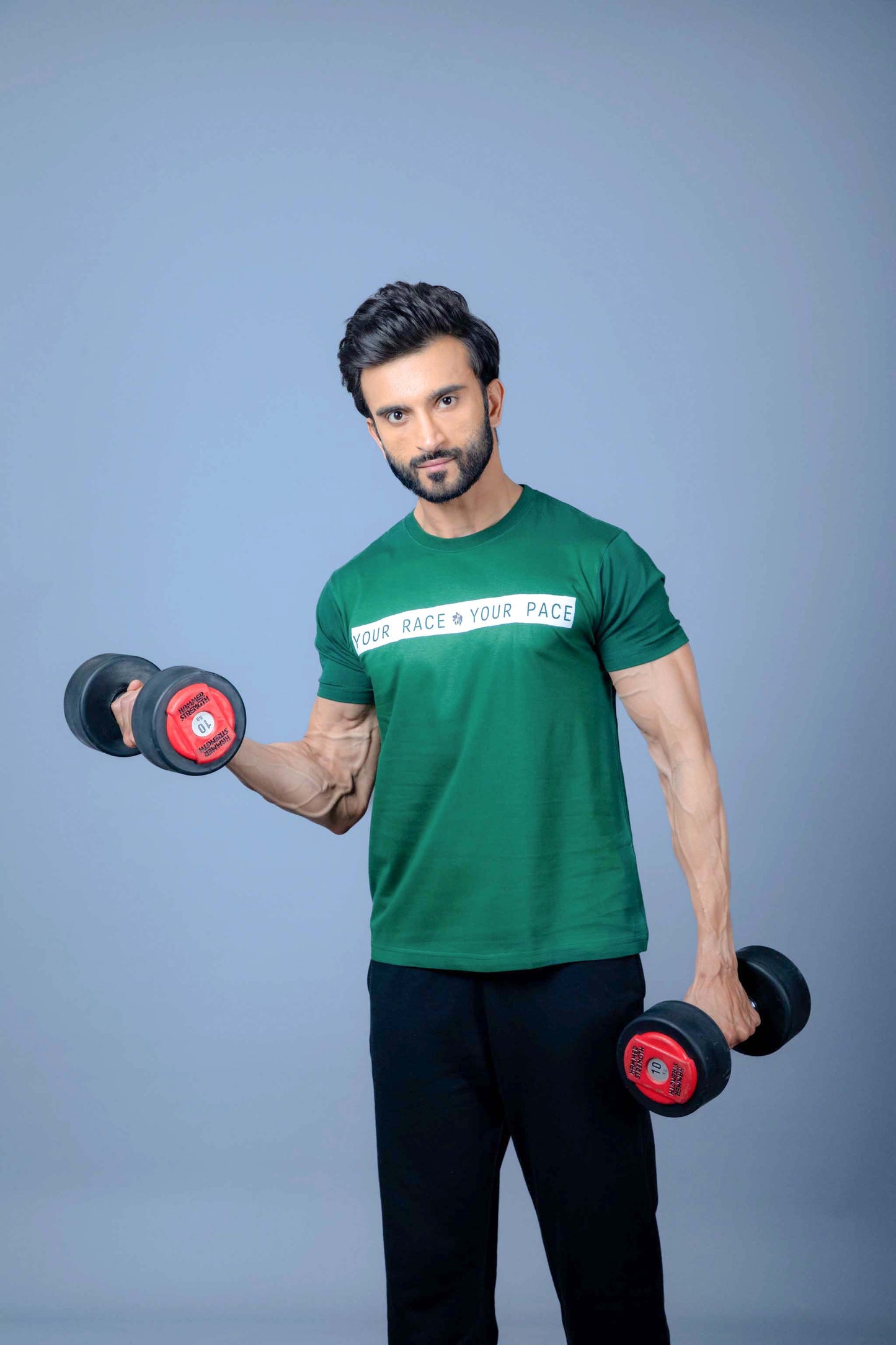 Man wearing a dry fit t-shirt, designed for comfort, breathability, and moisture control during workouts
